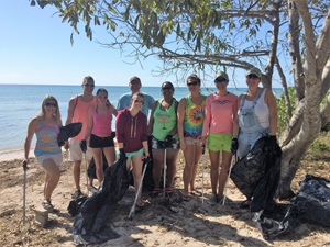 Photo of Margaritaville volunteers who helped clean-up debris from Boca Chica beach. Credit: Nicole Uibel/NOAA