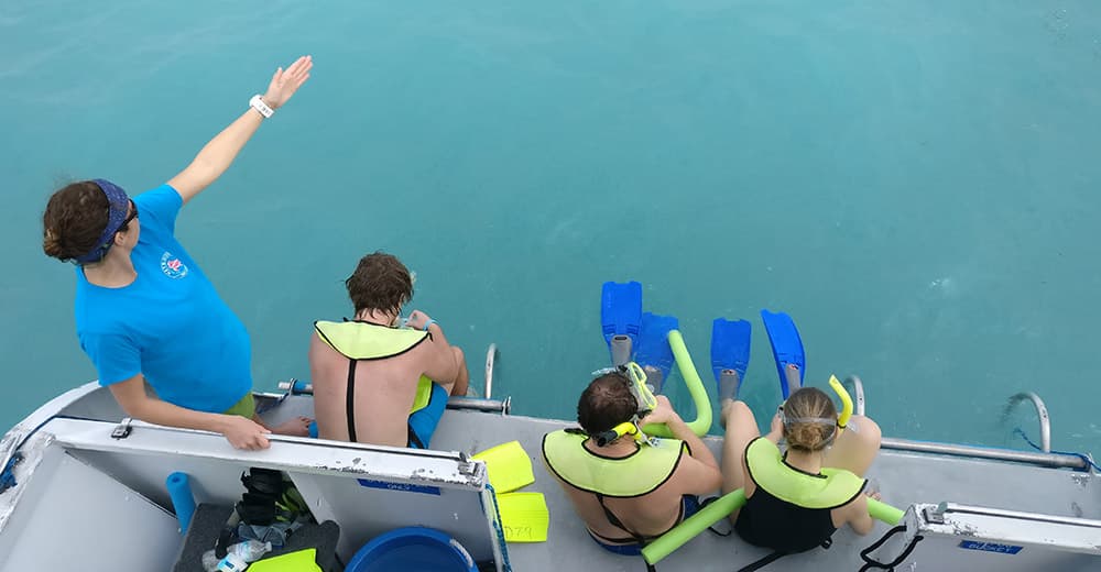 instructor giving a briefing to snorkelers