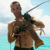 Photo of diver with a spiny lobster.