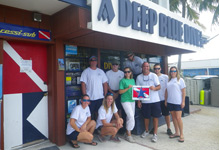 Photo of staff from A Deep Blue Dive receive Blue Star decal.