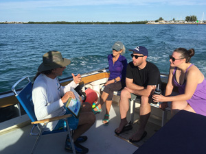 Namasté&rsquos co-owner, Jeff Bowman, showing the exent of the Florida Keys National Marine Sanctuary to customers on a recent reef excusion.